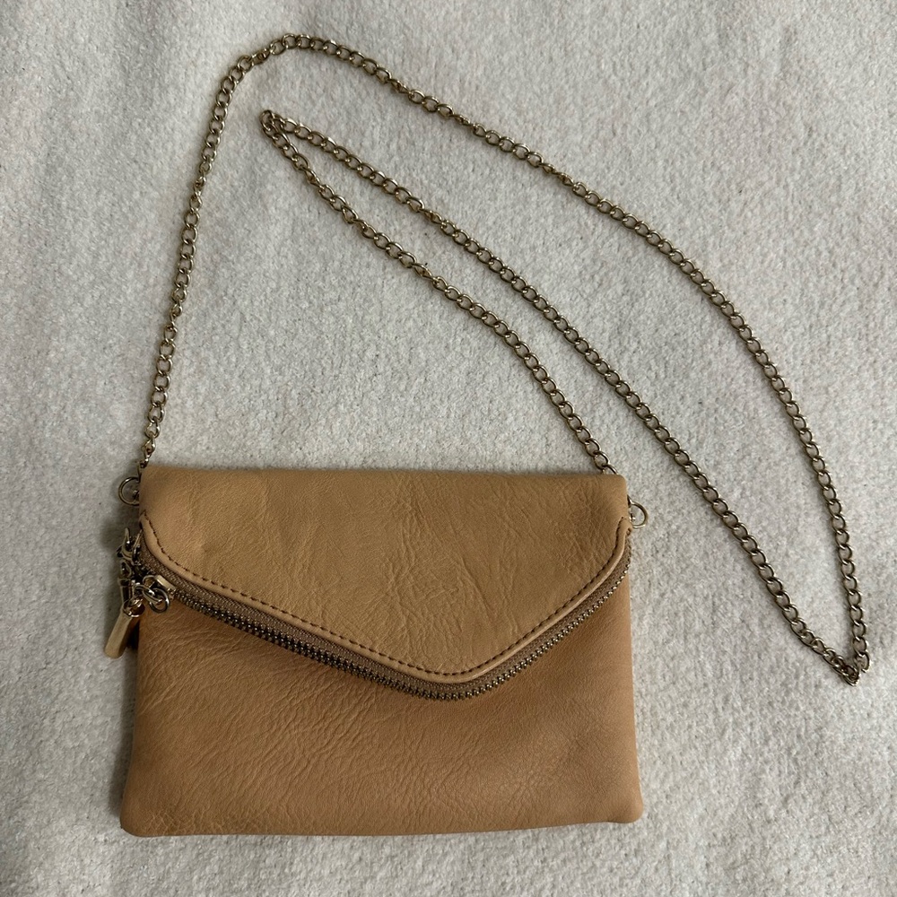 Tan clutch with gold crossbody chain